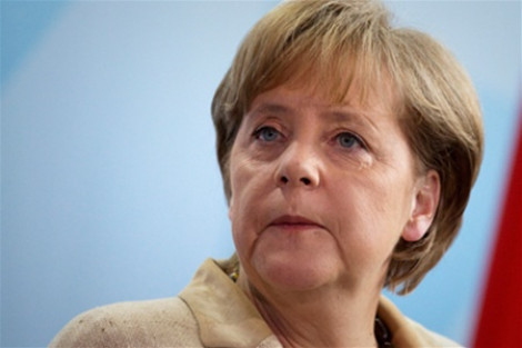 Олланд и Меркель обсудили с Порошенко выполнение "Минска"